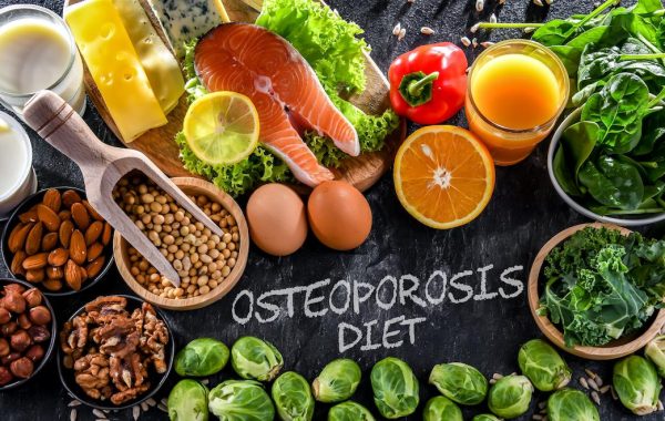 Whole fruits and vegetables with Osteoporosis diet writen in the middle